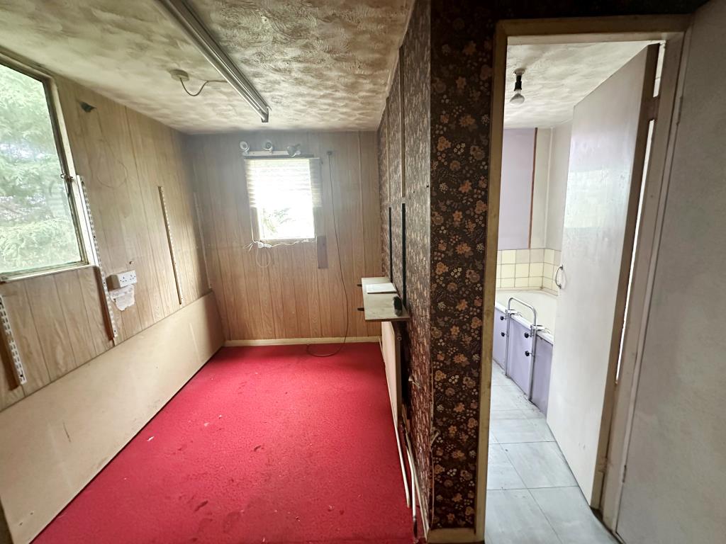Lot: 79 - DILAPIDATED DETACHED BUNGALOW - Bedroom with access to bathroom
